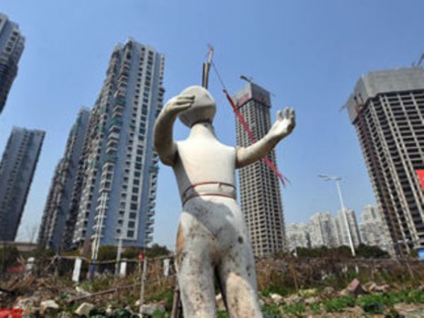 今天房奴明天富翁?港媒:内地 抢房潮或套牢 炒房