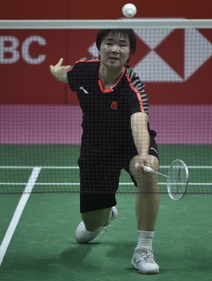 新华社发(王申摄) 二双对决中,中国队黄东萍/郑雨与对手邹美君/许嘉雯