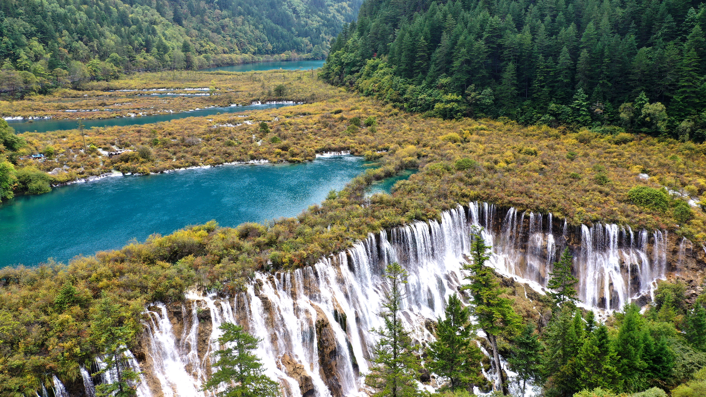 【携程攻略】四川诺日朗瀑布景点,诺日朗瀑布是老版西游记的拍摄地点，也是九寨沟最大瀑布，全景一定要…