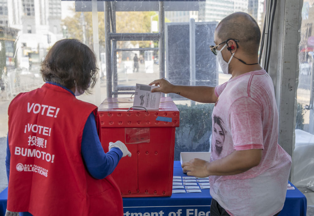 新华社|特朗普拜登终辩迎新规　关键“摇摆州”提前投票破纪录