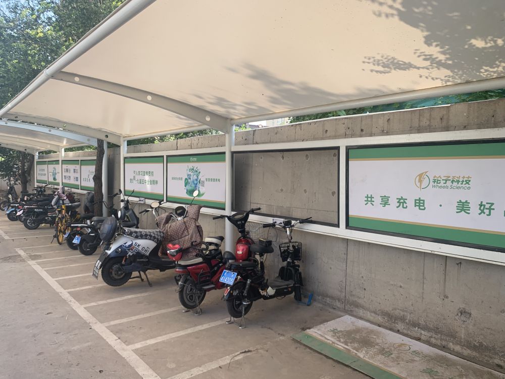 空间少,选址难,电动自行车"下楼"面临哪些障碍